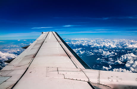 window view of right wing of aircraft thumbnail