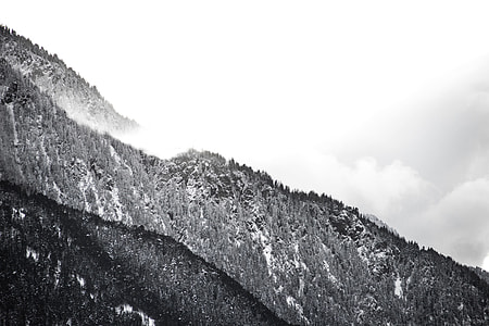 gray scale mountain range photo shot during daytime thumbnail