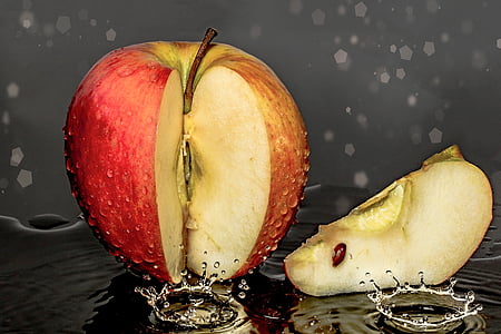 red slice of Apple with water drop thumbnail