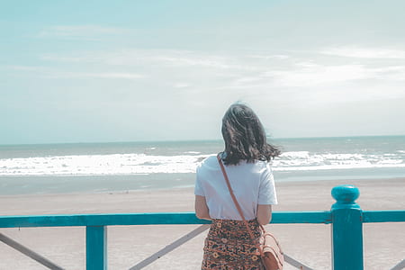 Woman Standing Near Seashore thumbnail