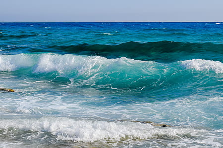 seawaves under blue and white skies thumbnail