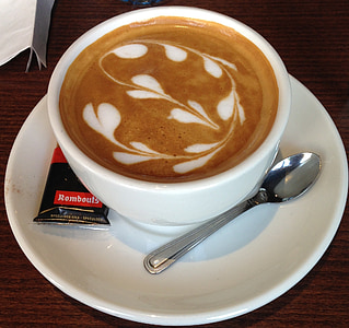 cappuccino in white ceramic teacup thumbnail