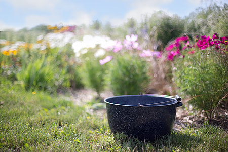 shallow focus photography of black bucket thumbnail