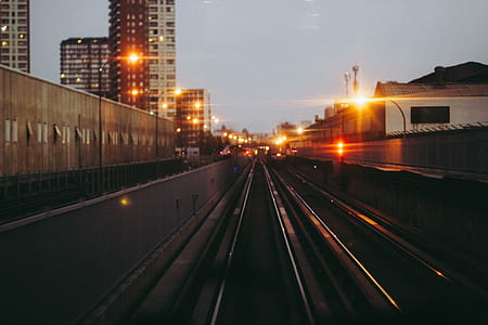 time lapse photography of train rail thumbnail