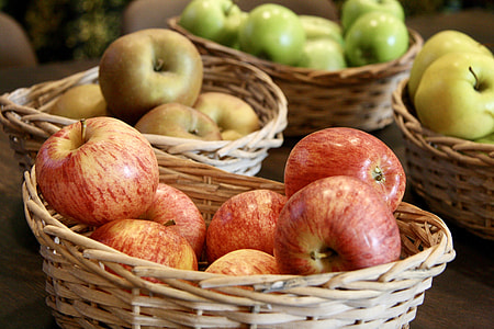 brown wicker basket filled with apples thumbnail