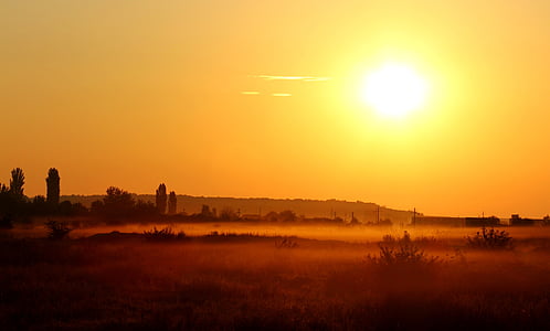 orange sun and desert terrain thumbnail