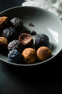 chocolate rolls on round gray ceramic bowl thumbnail