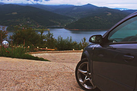 Black Car Parked Near Trees thumbnail