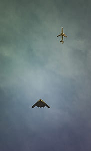 low angle view of two aircraft flying wallpaper thumbnail