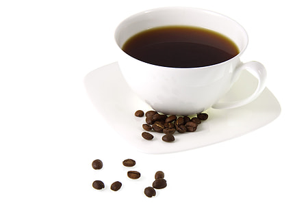 white ceramic cup with coffee and coffee beans on saucer thumbnail