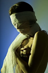 woman naked with white textile on her face thumbnail