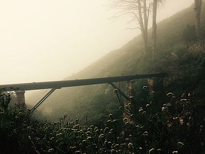 photo of foggy mountain with bridge thumbnail