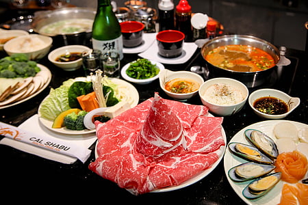 food photography of raw meat and dips thumbnail