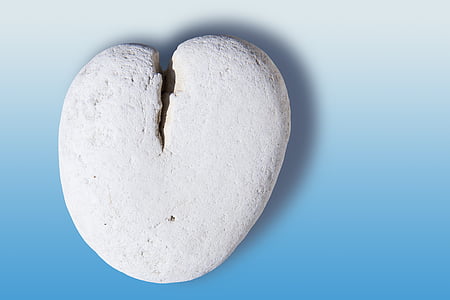 white stone on blue surface thumbnail