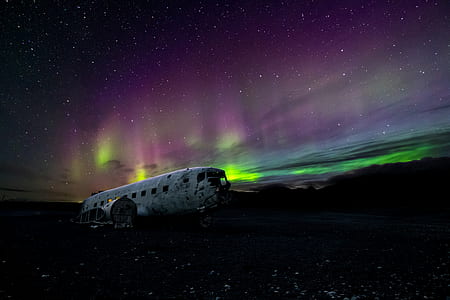 grey and black plane during night time thumbnail