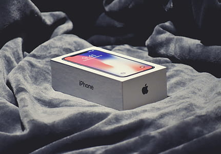 space gray iPhone X box on gray textile thumbnail