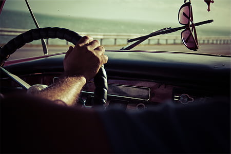 man driving near sea thumbnail