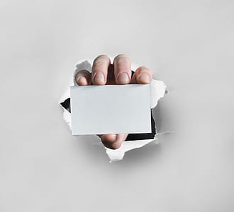 person holding white blank card thumbnail