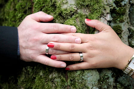 man and woman holding hands thumbnail