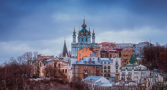 white and blue castle beside buildings thumbnail