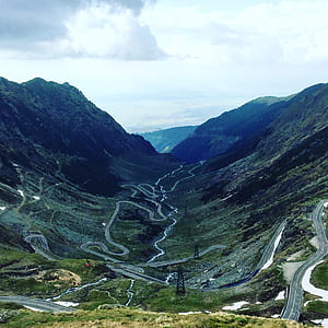 photo of mountains during daytime thumbnail