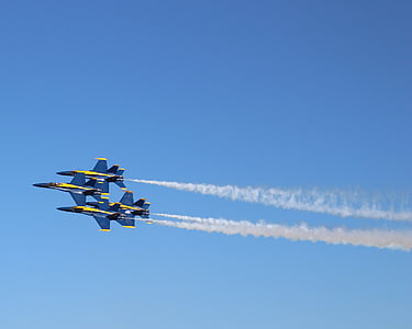 four gray jets leaving contrails thumbnail