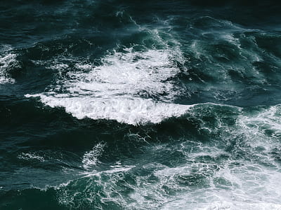 water waves during daytime thumbnail