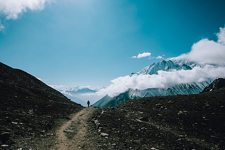 man walking on mountain thumbnail