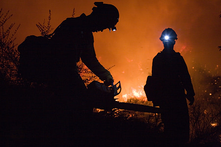 silhouette of man with headlamps thumbnail