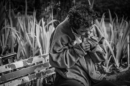 grayscale photo of man smoking thumbnail