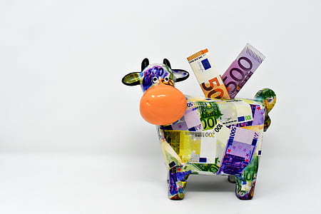 multicolored Euro banknote print cow ceramic coin bank thumbnail
