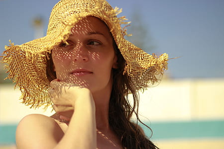 woman wearing yellow hat thumbnail