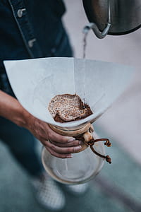 photo of person pouring pitcher with strainer thumbnail