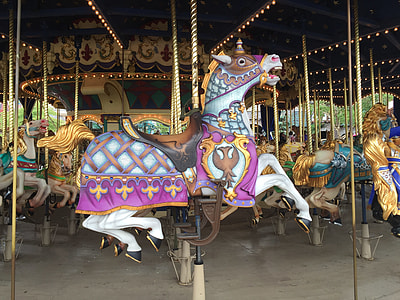 white and pink ride-on horse carousel thumbnail
