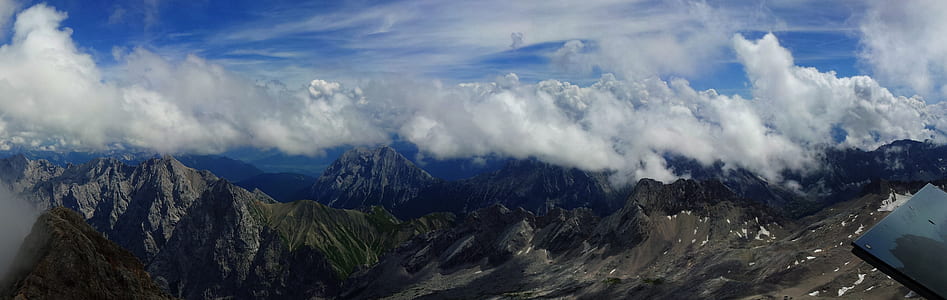 bird's-eye photography of mountains under alto cumulus clouds thumbnail