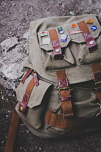 gray backpack on gray surface thumbnail