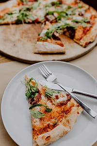 Eating delicious pizza in a cozy restaurant thumbnail