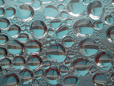 closeup of white droplets on surface thumbnail