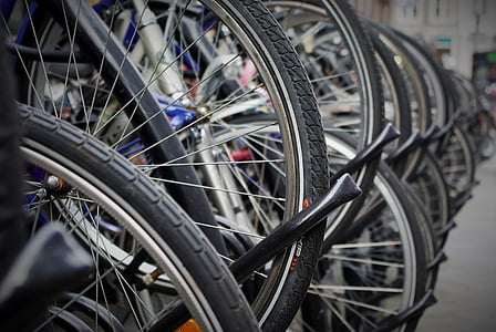 pile of bicycles park on road thumbnail