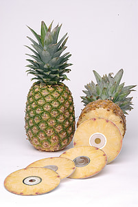 two pineapple fruits on white surface thumbnail