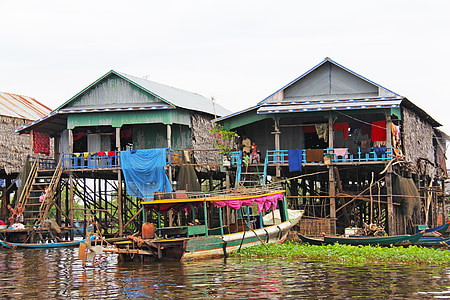 white and green boat in body of water thumbnail