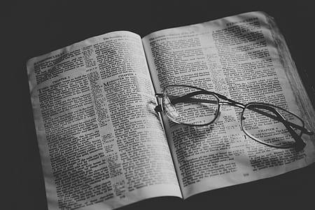 eyeglasses on opened book thumbnail