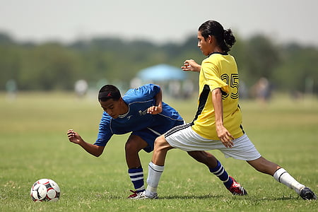 two men playing soccer thumbnail