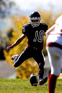 football player playing at the field thumbnail