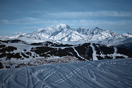aerial photography of mountains covered with snow at daytime thumbnail