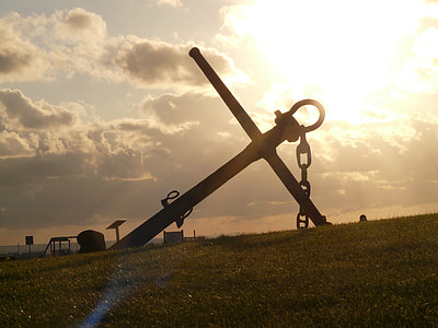 silhouette of cross during sunset thumbnail