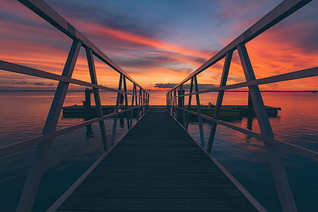 black and gray boardwalk during sunset photography thumbnail