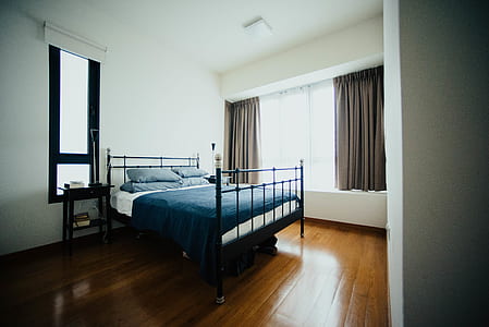 bed and blue bed sheet inside thumbnail