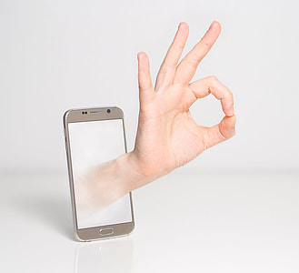 silver Samsung Galaxy S6 displaying 3D hand thumbnail