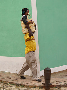 man carrying basket and girl thumbnail